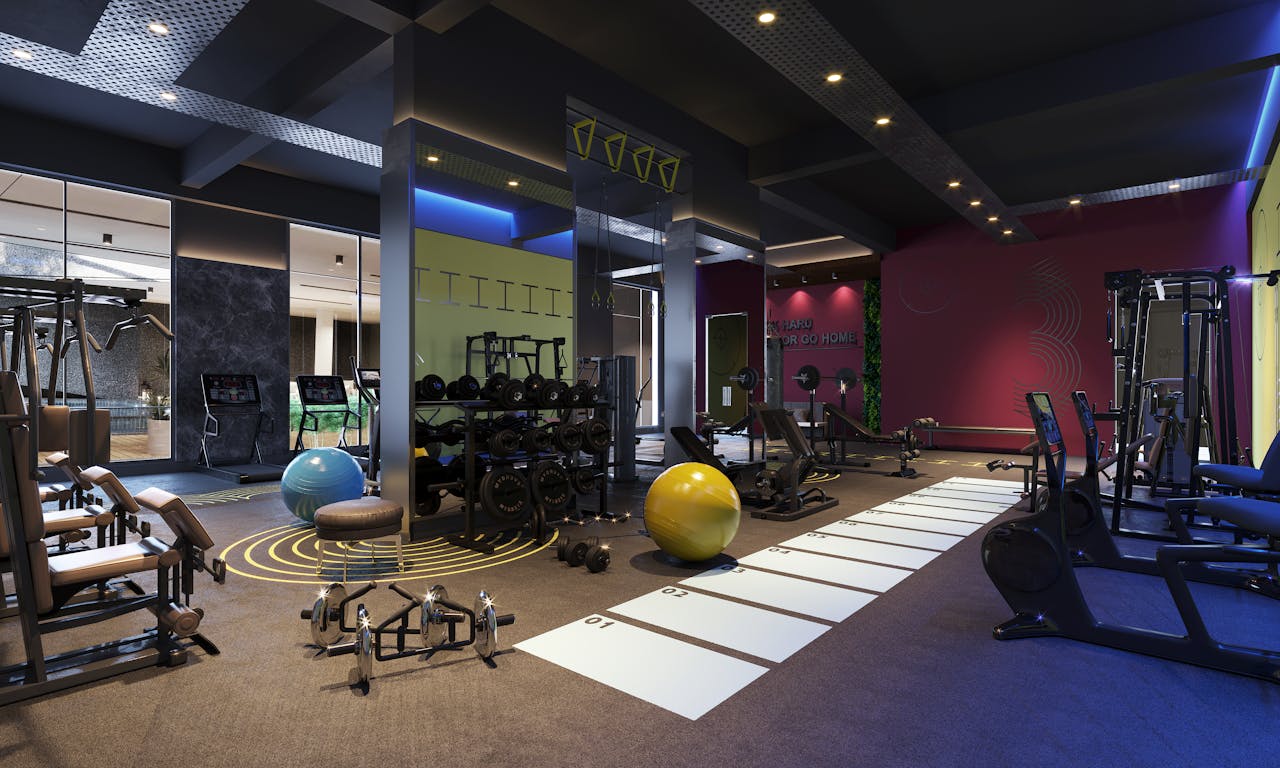 hero-img Spacious gym interior showcasing equipment for exercise and fitness training.